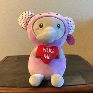 ‘Hug Me” Elephant Wearing a Purple Hood with Ears Plush Toy